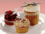 Almond cupcakes with raspberry glaze, ...