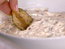 Cracked pepper potato crisps with onion dip