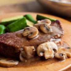 Swanson® Pan-Seared Steaks with Mushroom Gravy