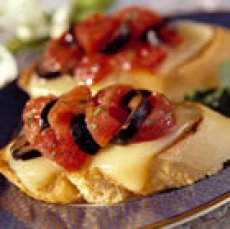 Tomato Crostini with Fontina Cheese
